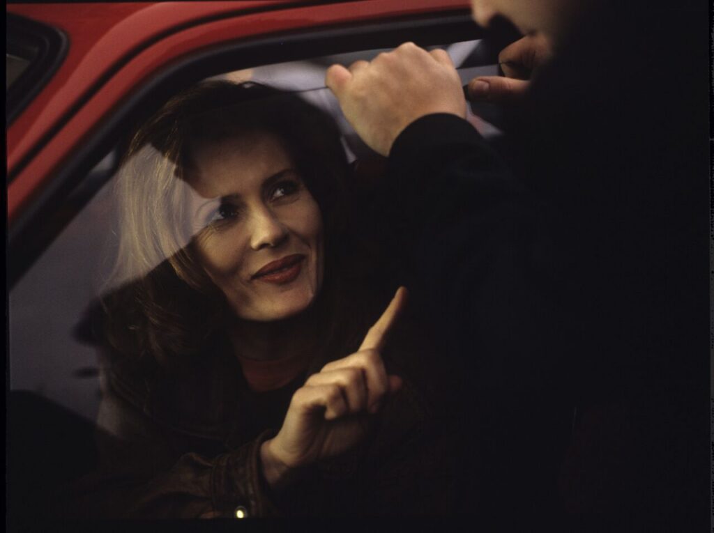 "Blonde" (Grażyna Szapołowska) in the car that Karol stopped. The scene did not appear in the movie.