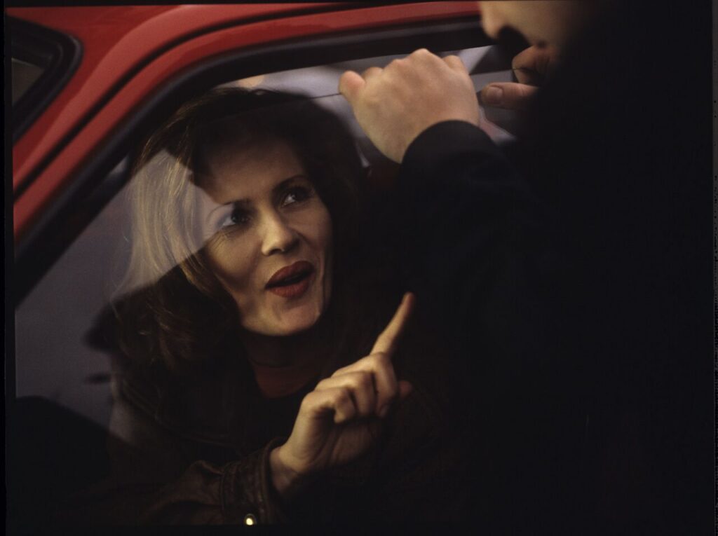"Blonde" (Grażyna Szapołowska) in the car that Karol stopped. The scene did not appear in the movie.