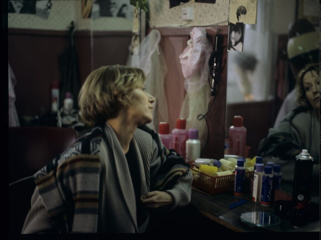 Mrs. Jadwiga (Teresa Budzisz-Krzyżanowska), a customer at the hairdressing salon of Jurek, Karol's brother.