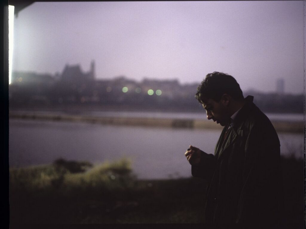 Karol (Zbigniew Zamachowski) with his talisman - a two-franc coin brought from France.