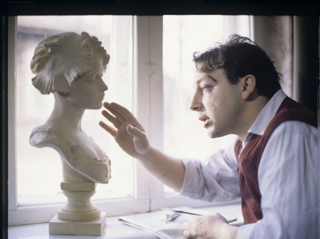 Karol (Zbigniew Zamachowski) stares at the plaster bust of a woman brought from Paris.
