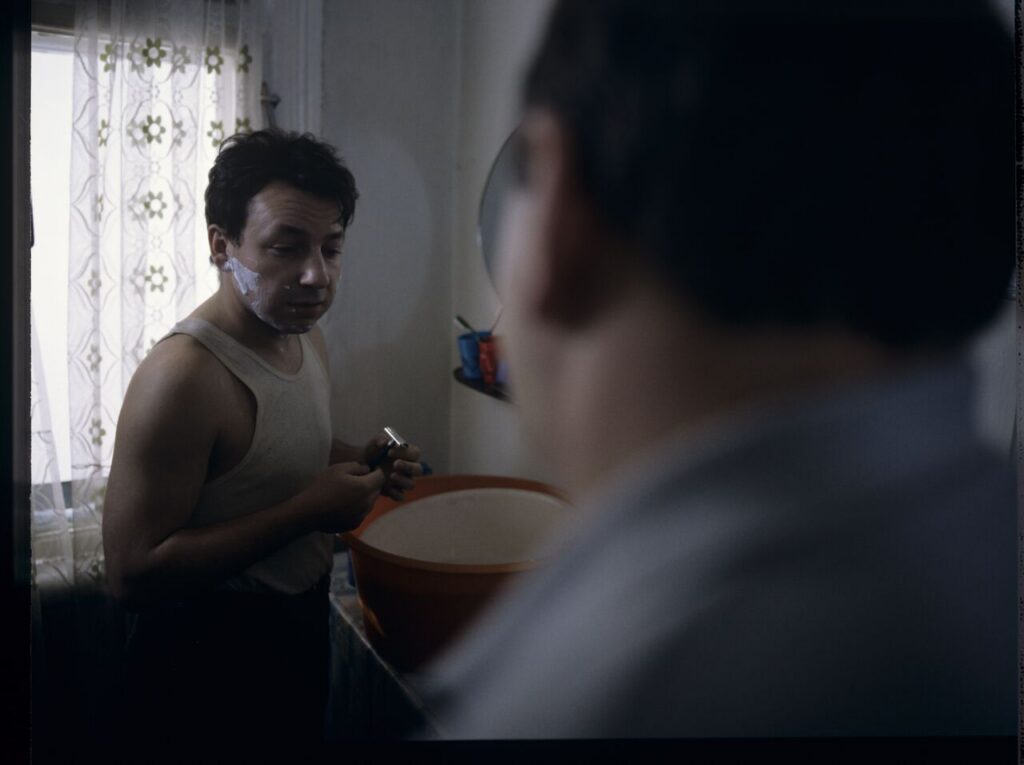 Karol (Zbigniew Zamachowski) is preparing to leave home on business.