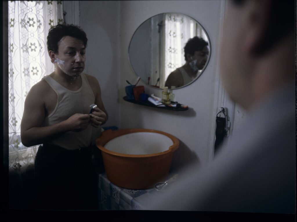 Karol (Zbigniew Zamachowski) is preparing to leave home on business.