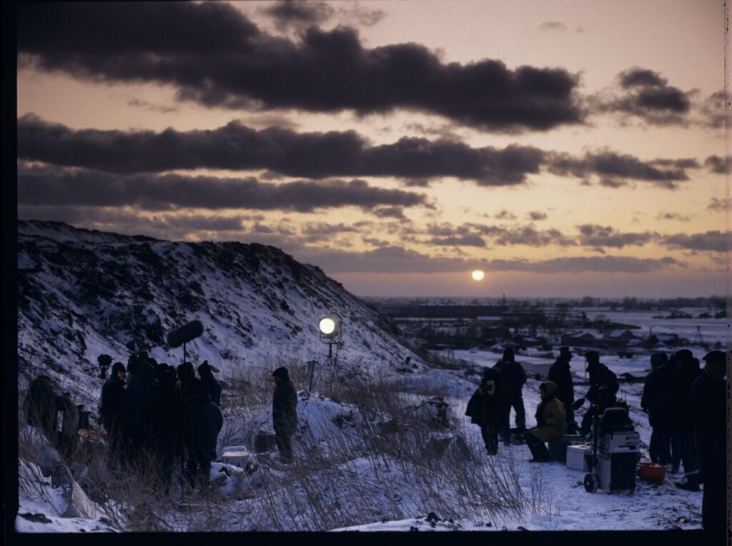 The crew on set at a garbage dump.