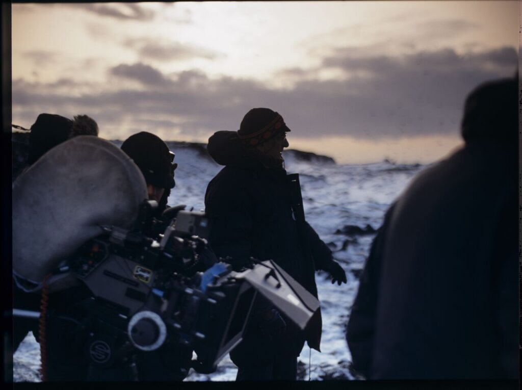 The crew on set at a garbage dump.