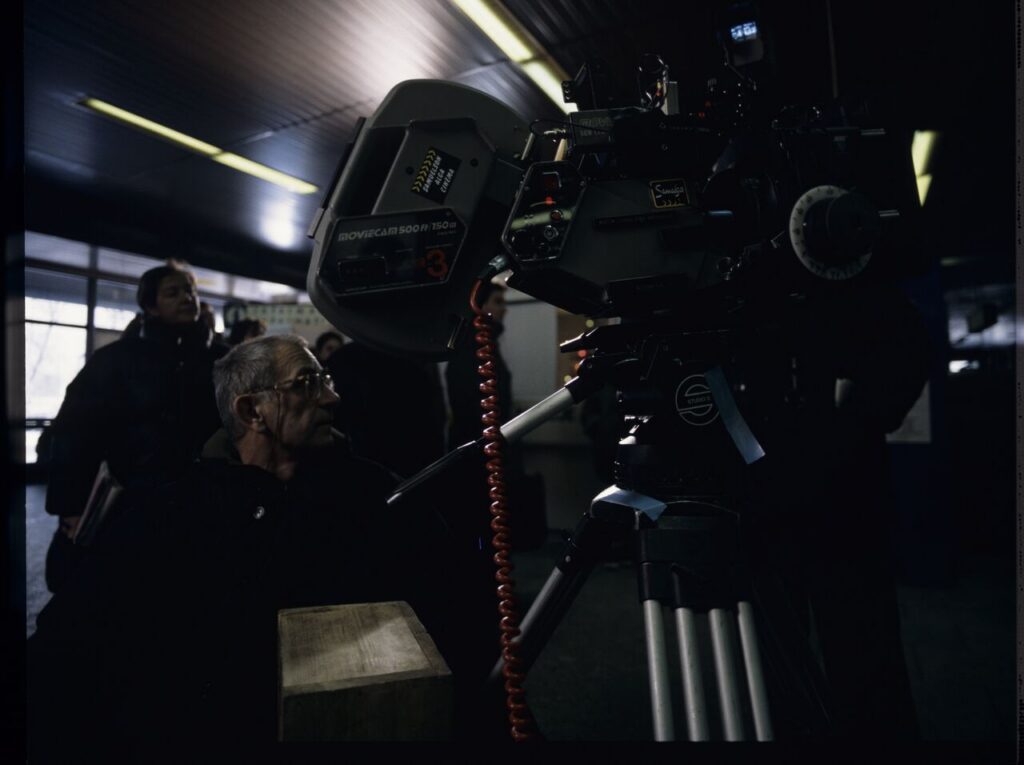 Krzysztof Kieślowski (director) on the set at the airport in Warsaw.