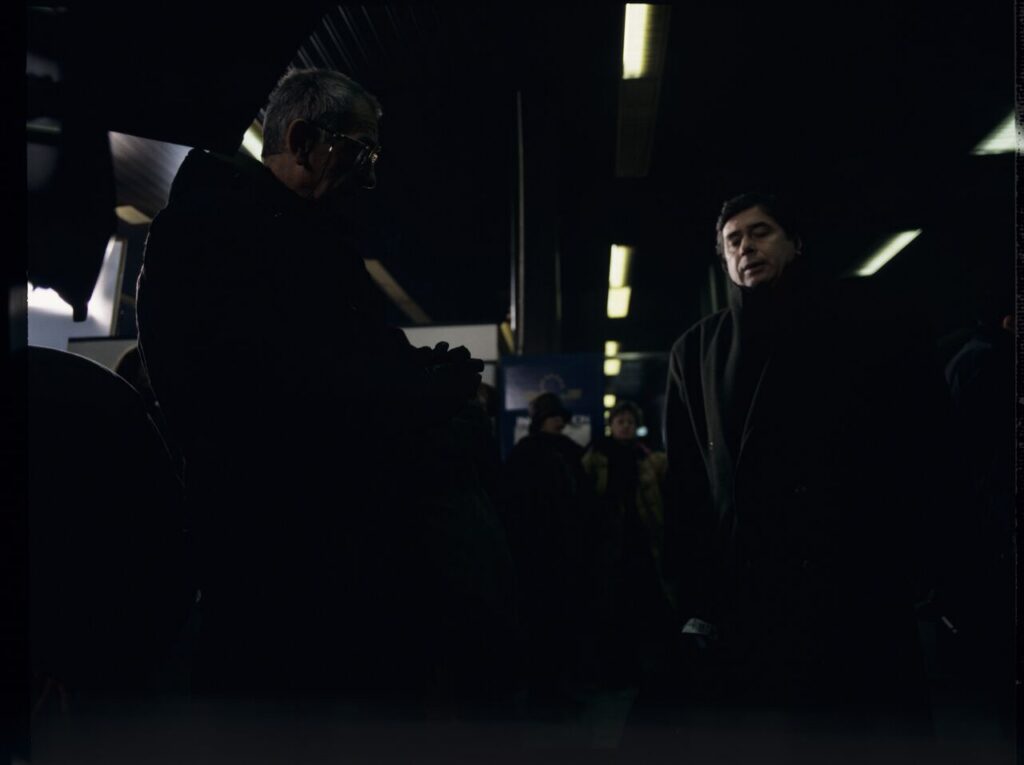 Kieślowski (director) and Janusz Gajos (player of the role of Mikołaj) on the shooting set at the airport in Warsaw.