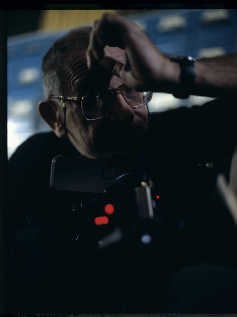 Krzysztof Kieślowski (director) on the set at the airport in Warsaw.