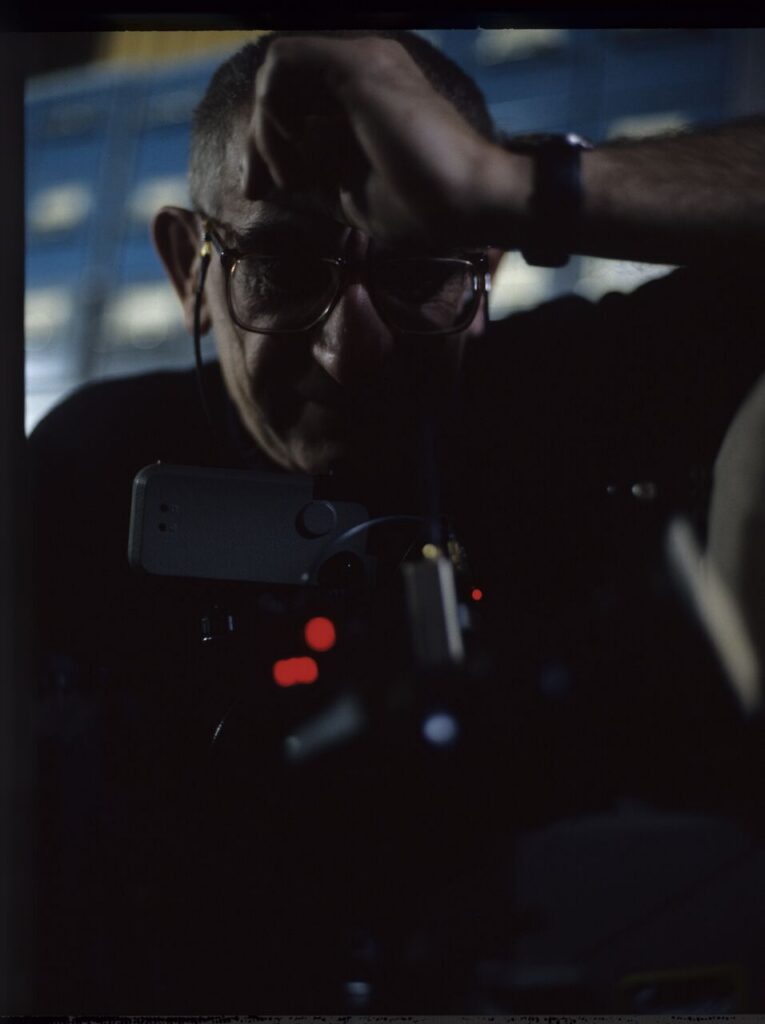 Krzysztof Kieślowski (director) on the set at the airport in Warsaw.