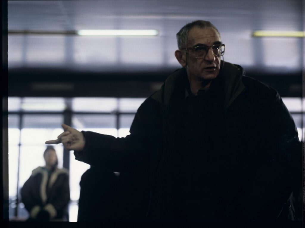 Krzysztof Kieślowski (director) on the set at the airport in Warsaw.