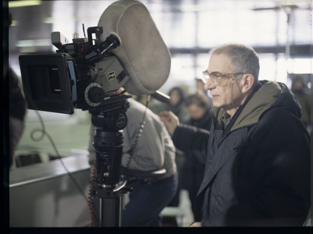 Krzysztof Kieślowski (director) on the set at the airport in Warsaw.