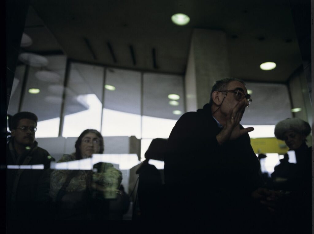 Krzysztof Kieślowski (director) on the set at the airport in Warsaw.