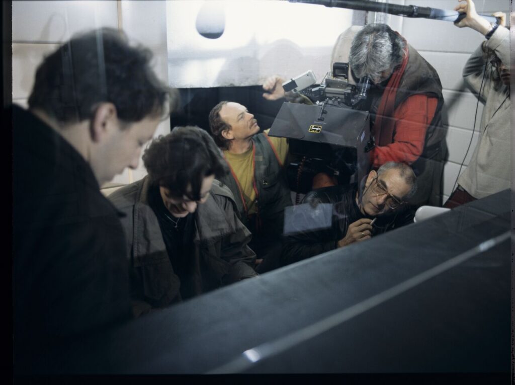 The crew on set during filming of the currency exchange scene.