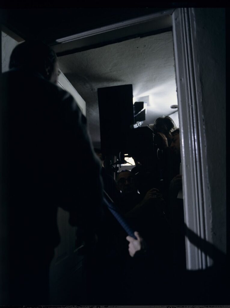 K. Kieślowski (director), E. Kłosiński (cinematographer), Z. Zamachowski (as Karol) and J. Stuhr (as Jurek) on the set.
