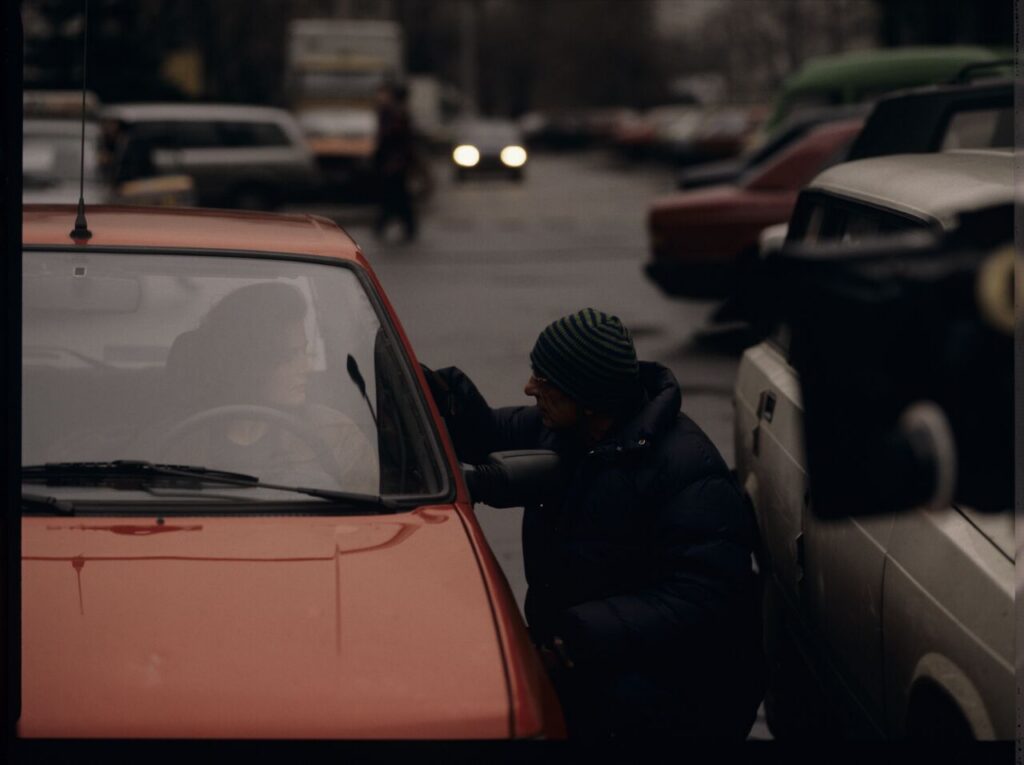 Krzysztof Kieślowski (director) gives instructions to Grażyna Szapołowska ("Blondynka") on the set.