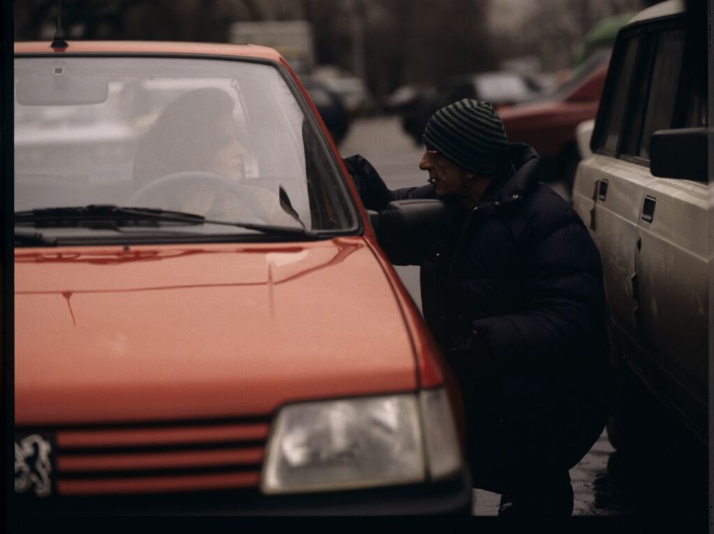 Krzysztof Kieślowski (director) gives instructions to Grażyna Szapołowska ("Blondynka") on the set.