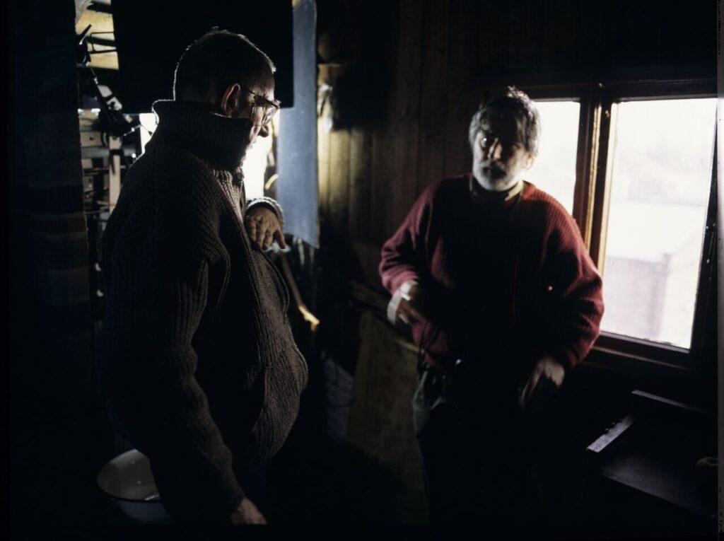 K. Kieślowski (director) and E. Kłosiński (cinematographer) on the set in the house of the farmer.
