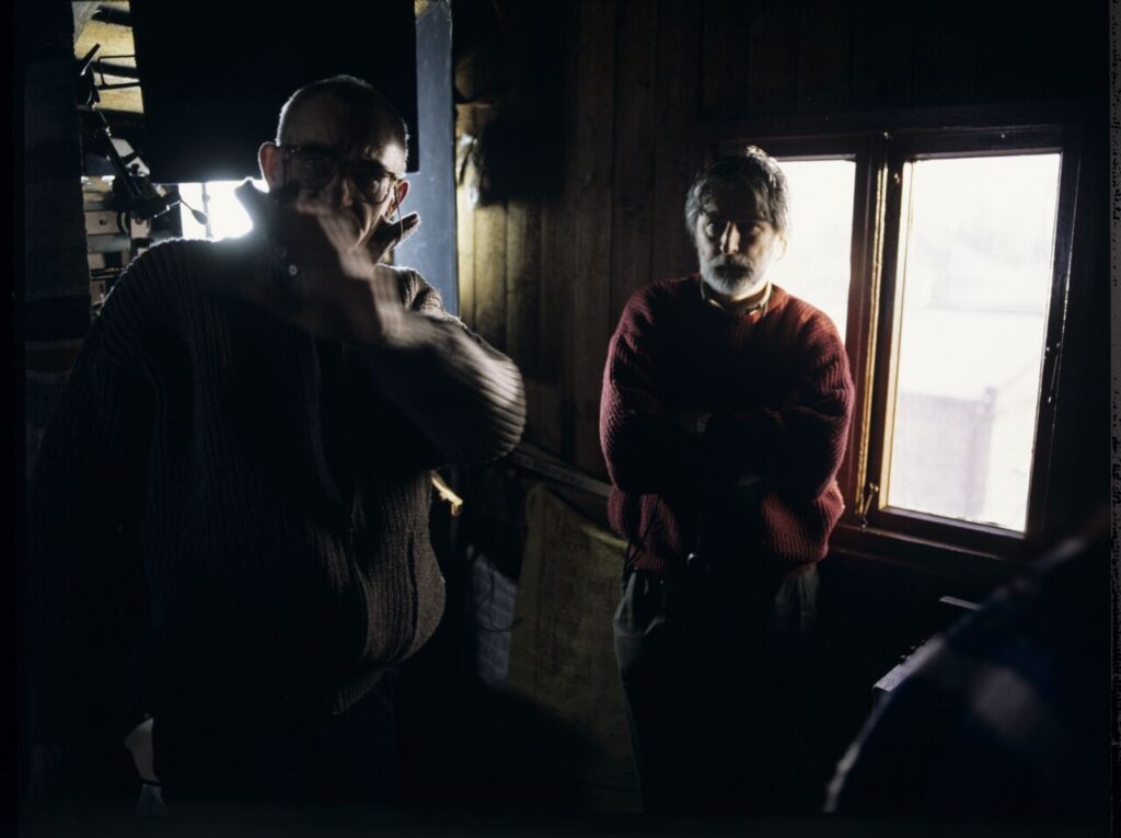 K. Kieślowski (director) and E. Kłosiński (cinematographer) on the set in the house of the farmer.