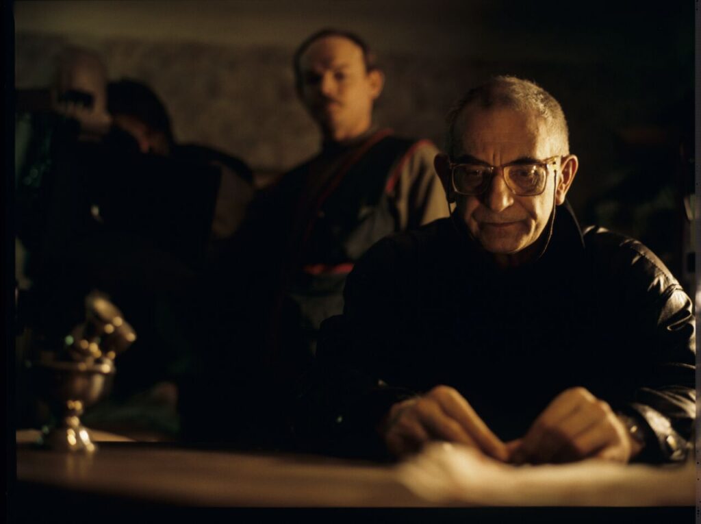 Krzysztof Kieślowski (director) and Henryk Jedynak (assistant cameraman) on the set in the house of the farmer.
