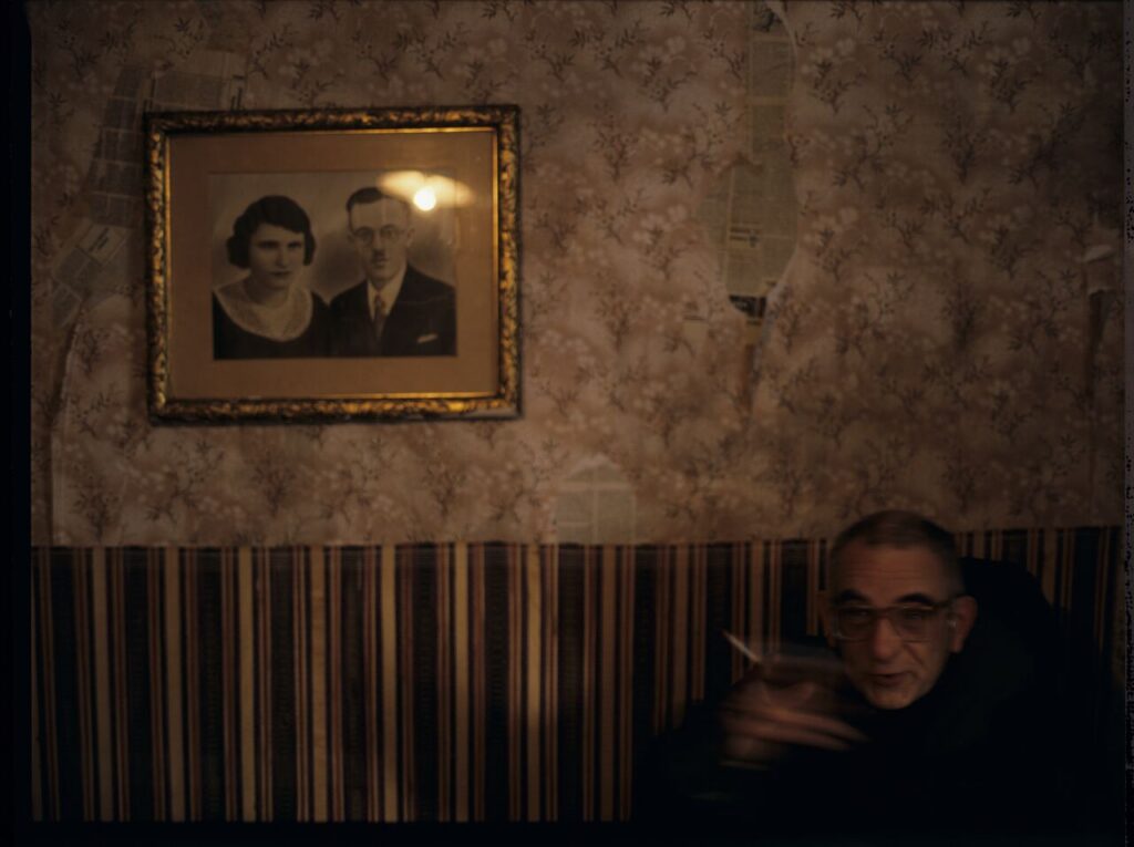 Krzysztof Kieślowski on the set in the house of the farmer from whom Karol bought the land.