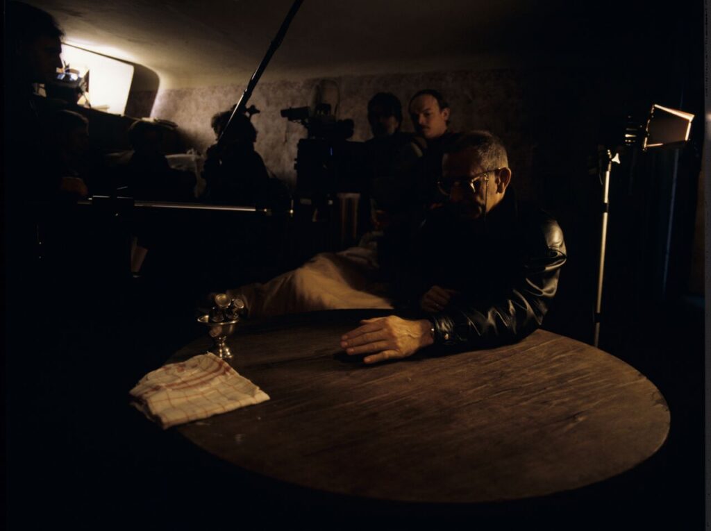 The crew is on set at the home of the farmer from whom Karol bought the land.