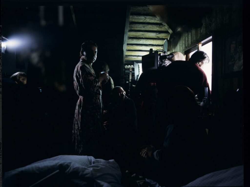 A break between takes on the set at the home of the farmer from whom Karol bought the land.