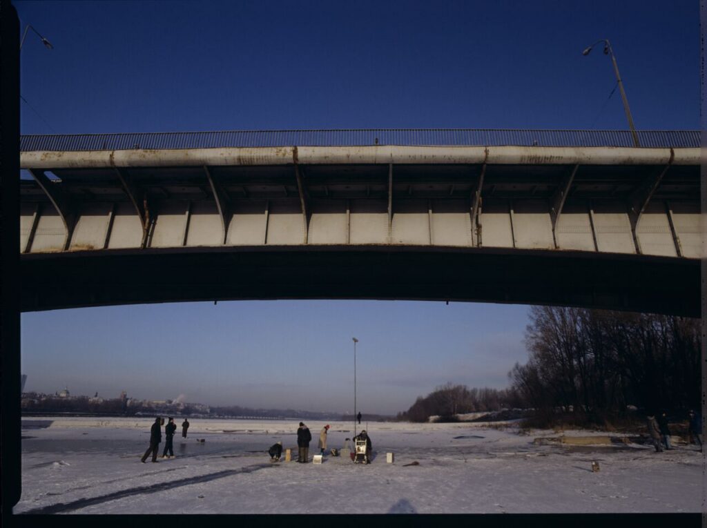 Krzysztof Kieślowski (director) on the frozen Vistula River, where the scene of the sliding will be filmed.