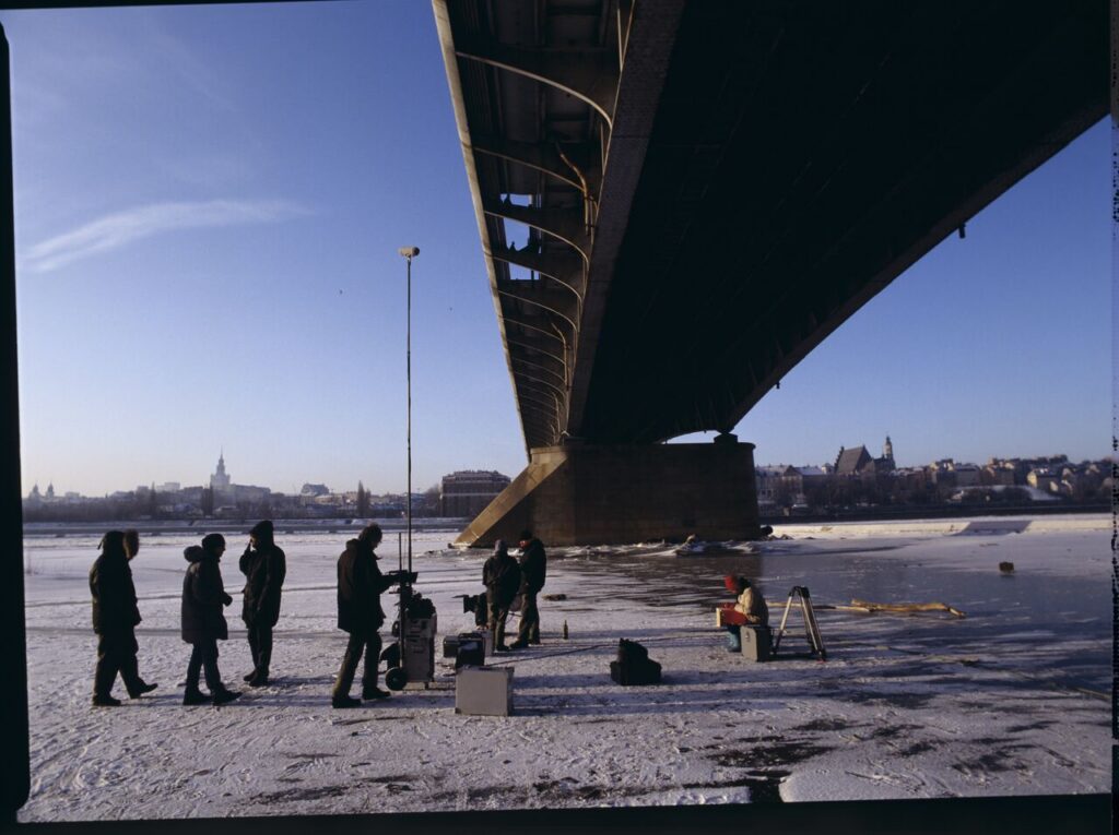 Krzysztof Kieślowski (director) on the frozen Vistula River, where the scene of the sliding will be filmed.