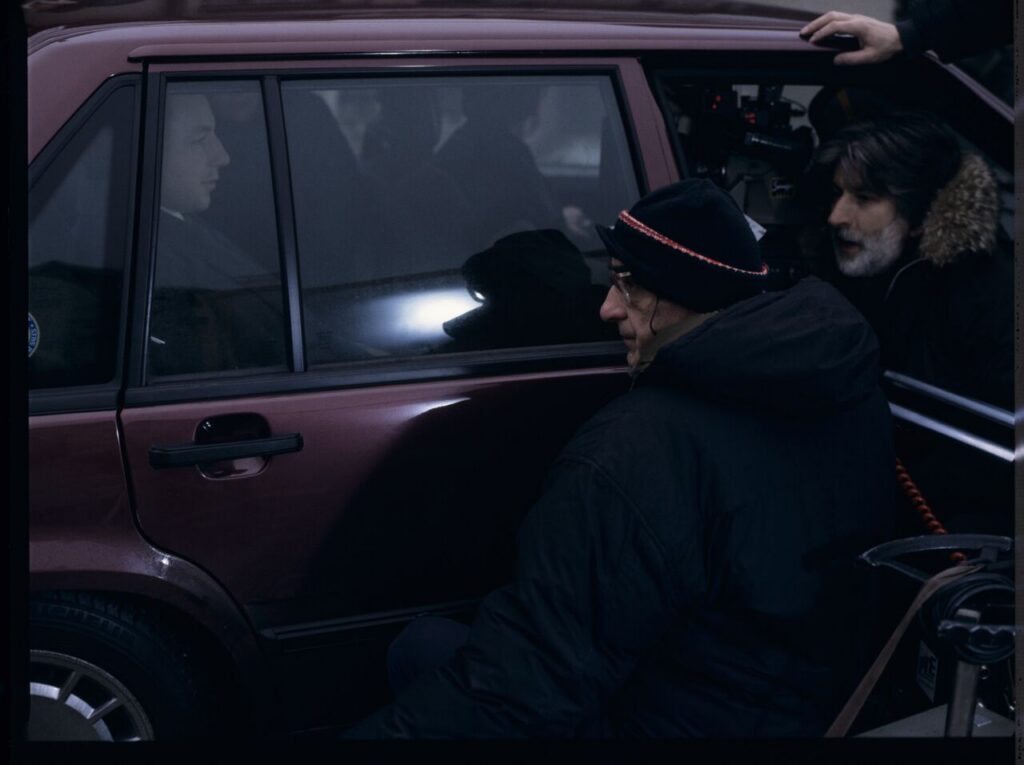 Filming the scene in which Karol (Z. Zamachowski) steps out of a car driven by driver Mr. Bronek (J. Trela).