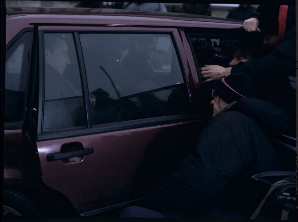 Filming the scene in which Karol (Z. Zamachowski) steps out of a car driven by driver Mr. Bronek (J. Trela).