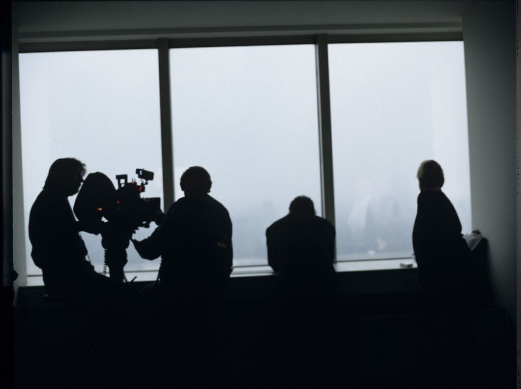 Preparations for filming a scene in Karol's new office at the Mariott Hotel.