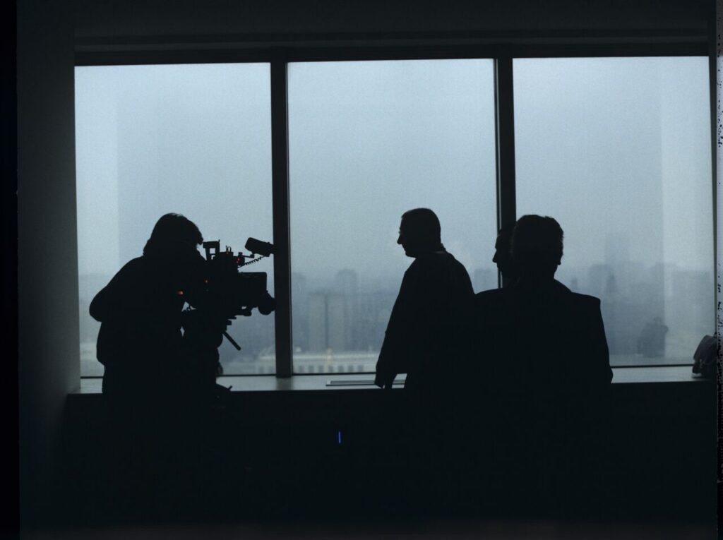 Preparations for filming a scene in Karol's new office at the Mariott Hotel.