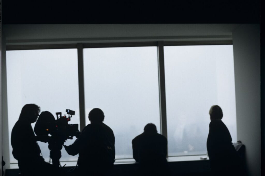 Preparations for filming a scene in Karol's new office at the Mariott Hotel.
