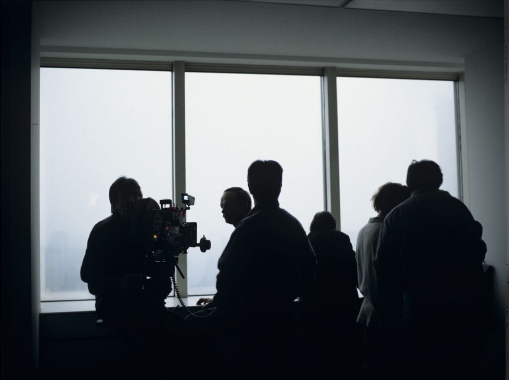 Preparations for filming a scene in Karol's new office at the Mariott Hotel.