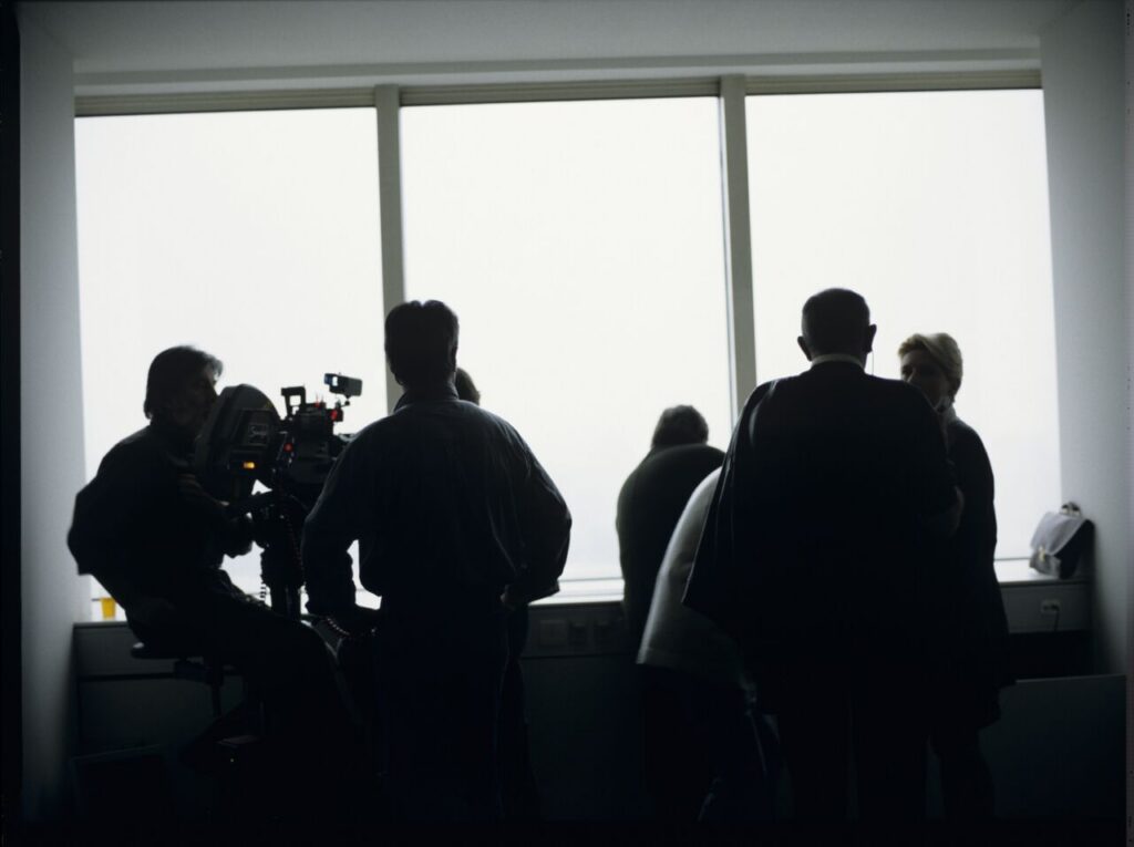 Preparations for filming a scene in Karol's new office at the Mariott Hotel.