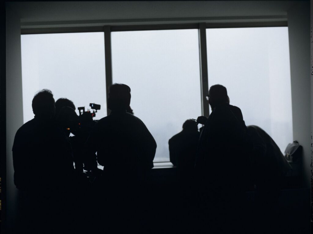 Preparations for filming a scene in Karol's new office at the Mariott Hotel.