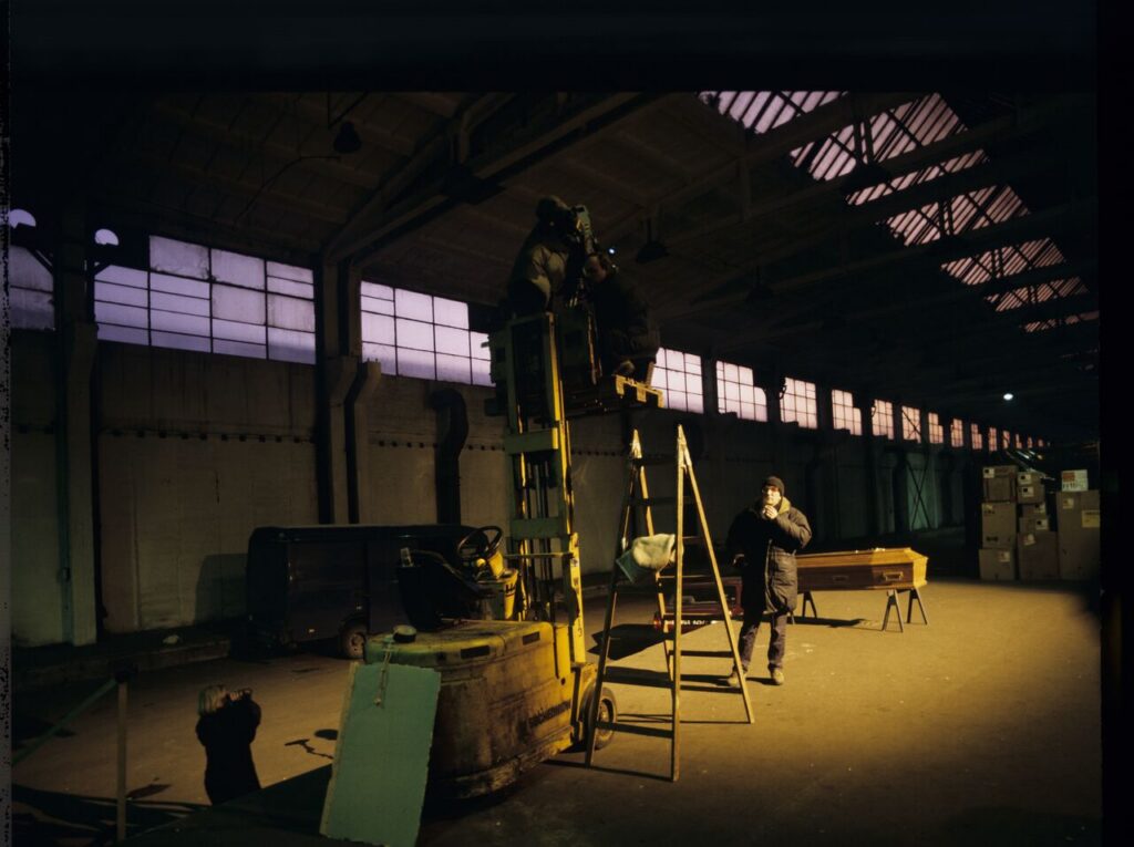 The crew preparing to film scenes at the headquarters of Karol's new company.