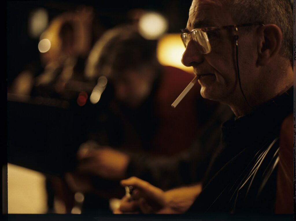 Krzysztof Kieślowski (director) while working on the set.