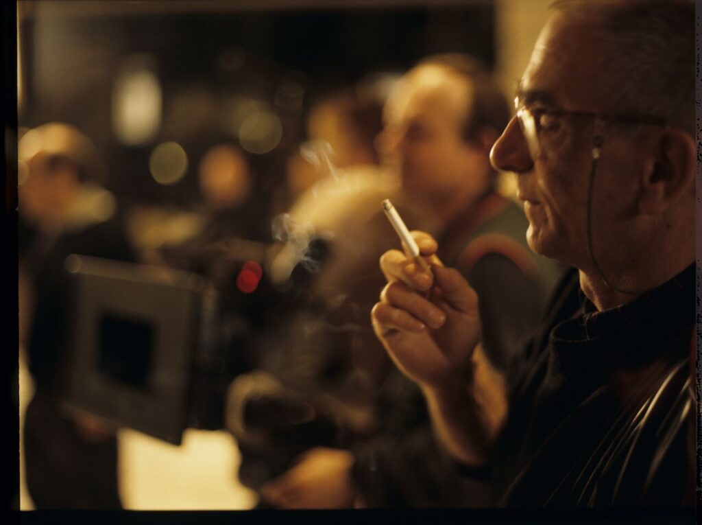 Krzysztof Kieślowski (director) while working on the set.