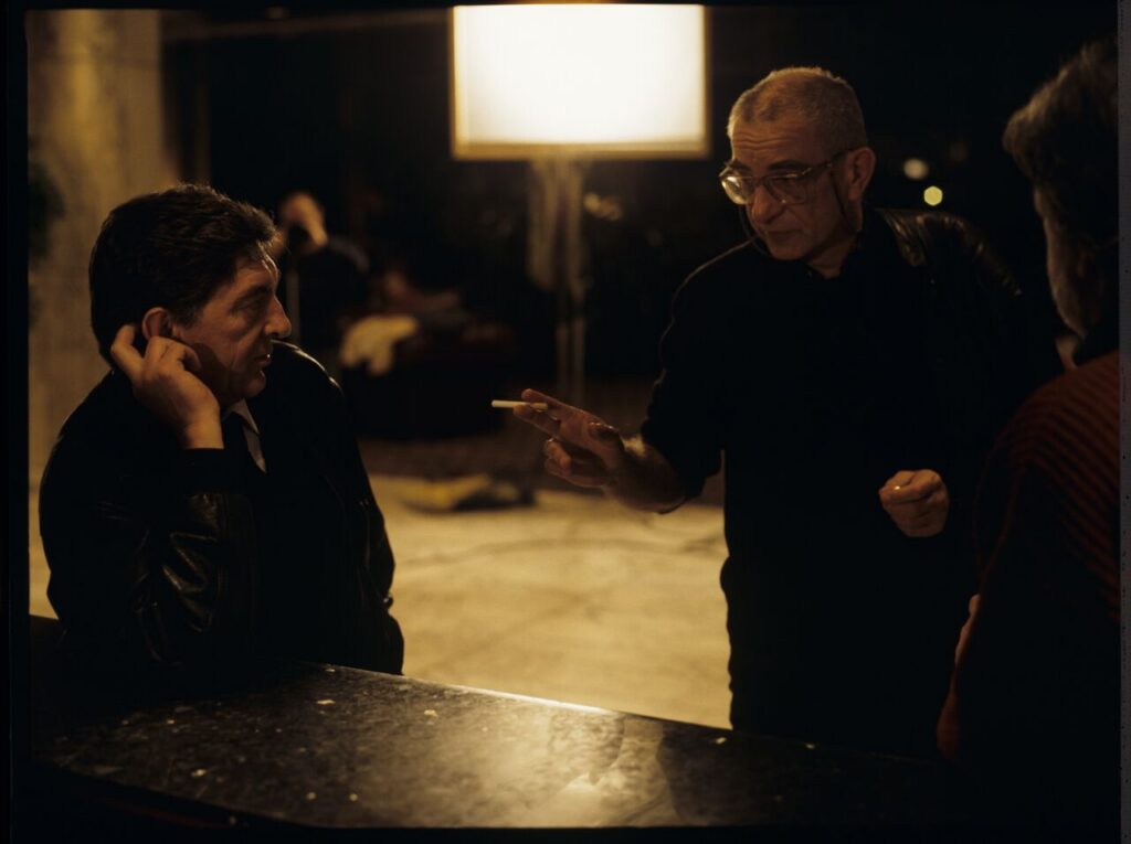 Krzysztof Kieślowski (director) gives instructions to Jerzy Trela, who plays Mr. Bronek.