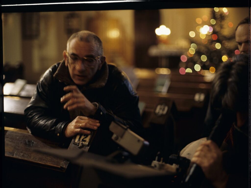 Krzysztof Kieślowski (director) and others working on the set.