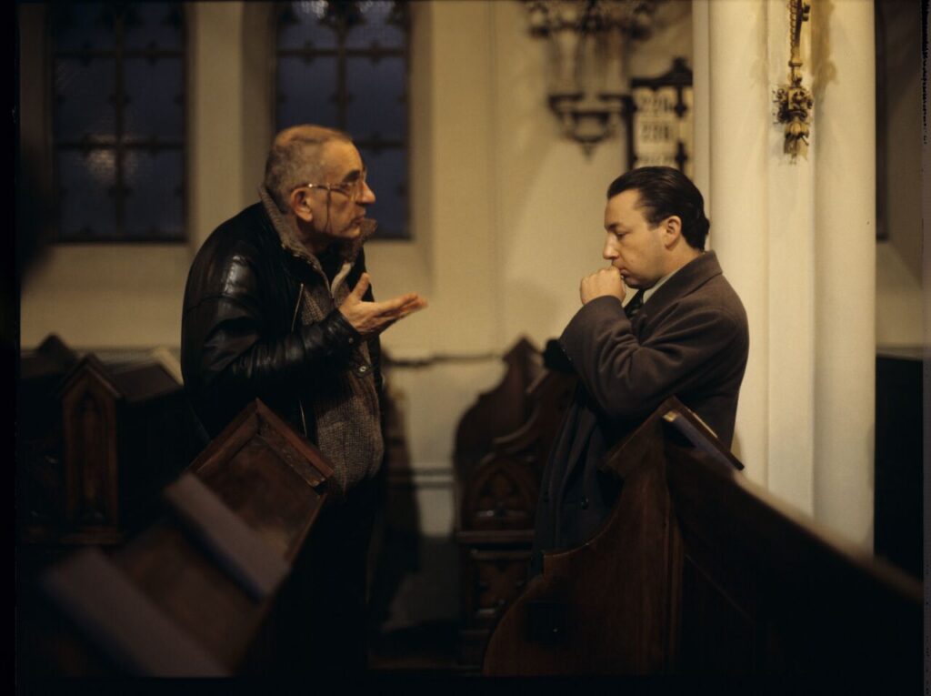 Krzysztof Kieślowski (director) and Zbigniew Zamachowski (actor, playing Karol) working on the set.