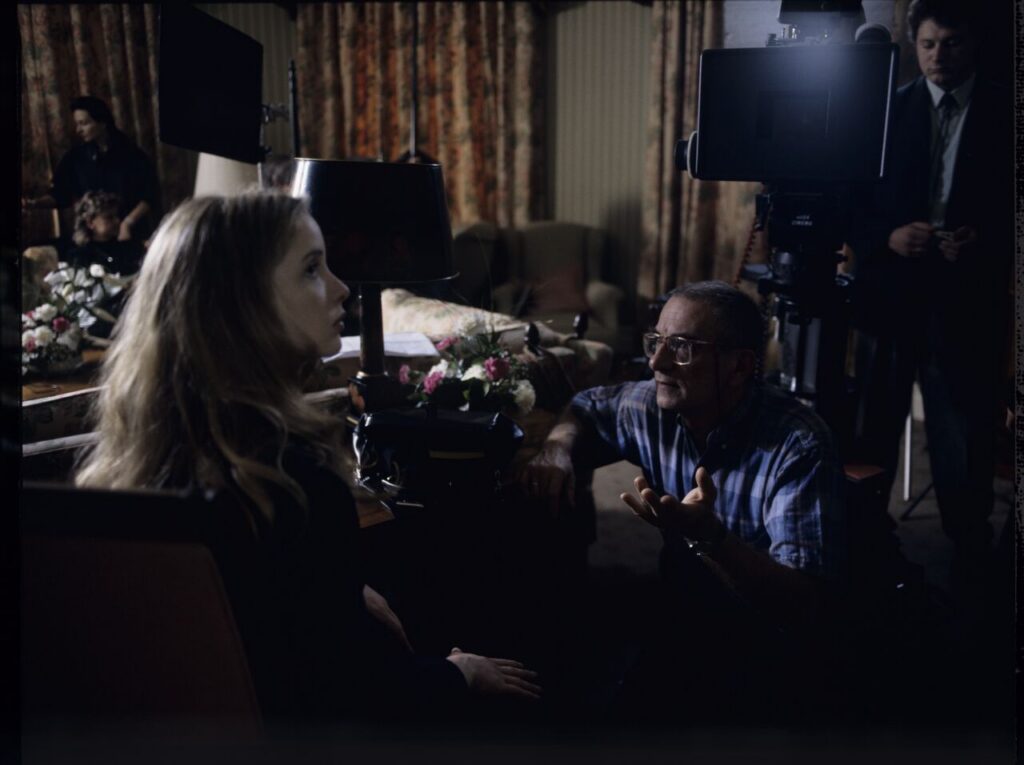 J. Delpy (playing Dominique) and K. Kieślowski (director) on set.