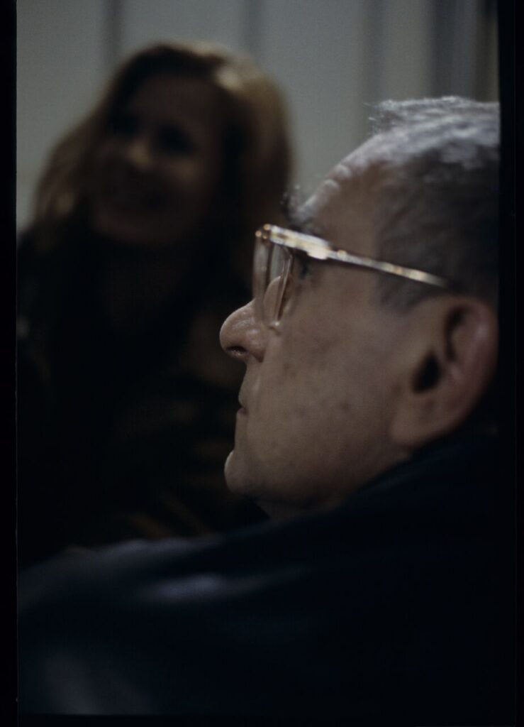 Krzysztof Kieślowski (director) on the set. In the background is actress Grażyna Szapołowska.