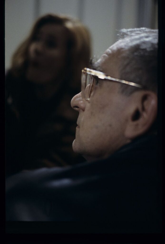 Krzysztof Kieślowski (director) on the set. In the background is actress Grażyna Szapołowska.