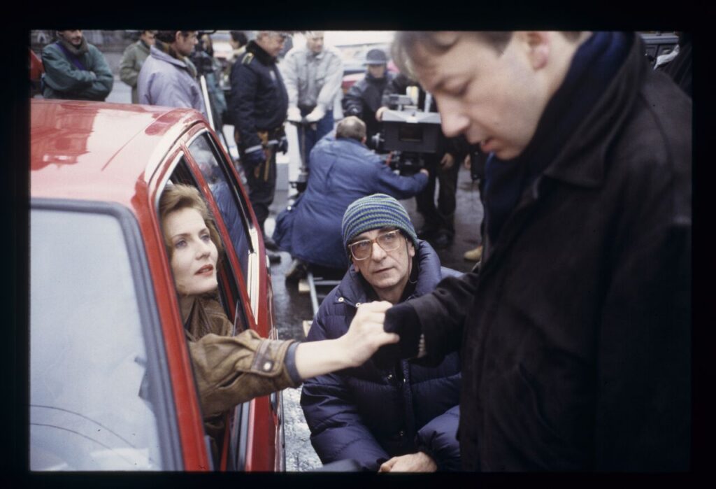 Krzysztof Kieślowski (director), Grażyna Szapołowska (as "Blondynka"), and Zbigniew Zamachowski (Karol).