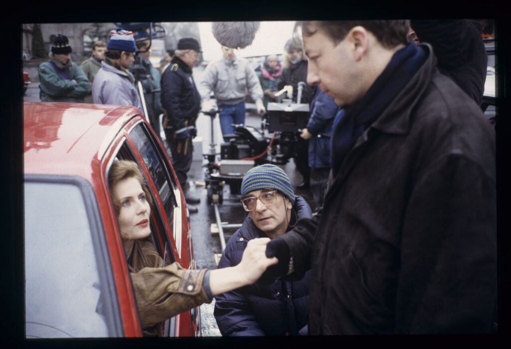 Krzysztof Kieślowski (director), Grażyna Szapołowska (as "Blondynka"), and Zbigniew Zamachowski (Karol).