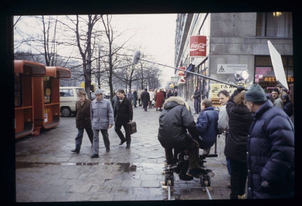 A set on a Warsaw street where Karol goes looking for work.