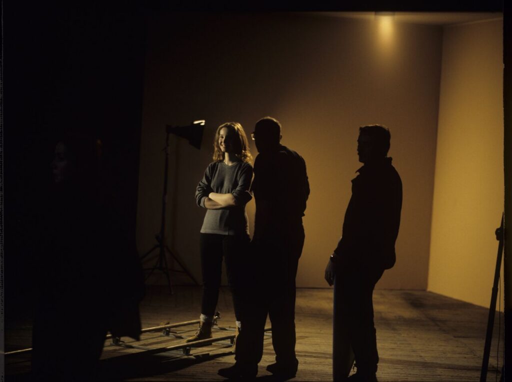 A set in a film studio, where a mock prison window was built.