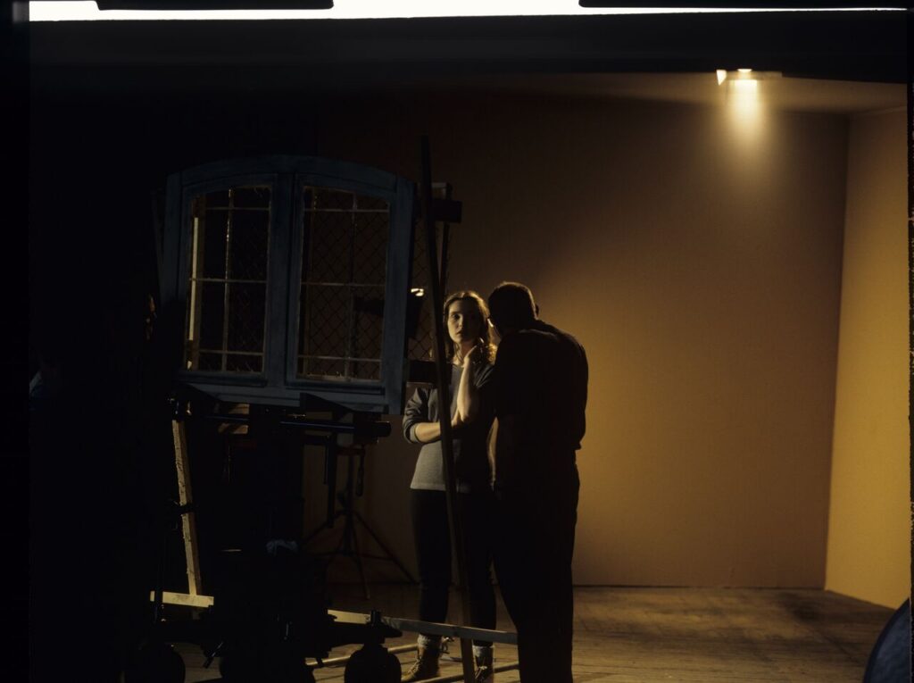 A set in a film studio, where a mock prison window was built.